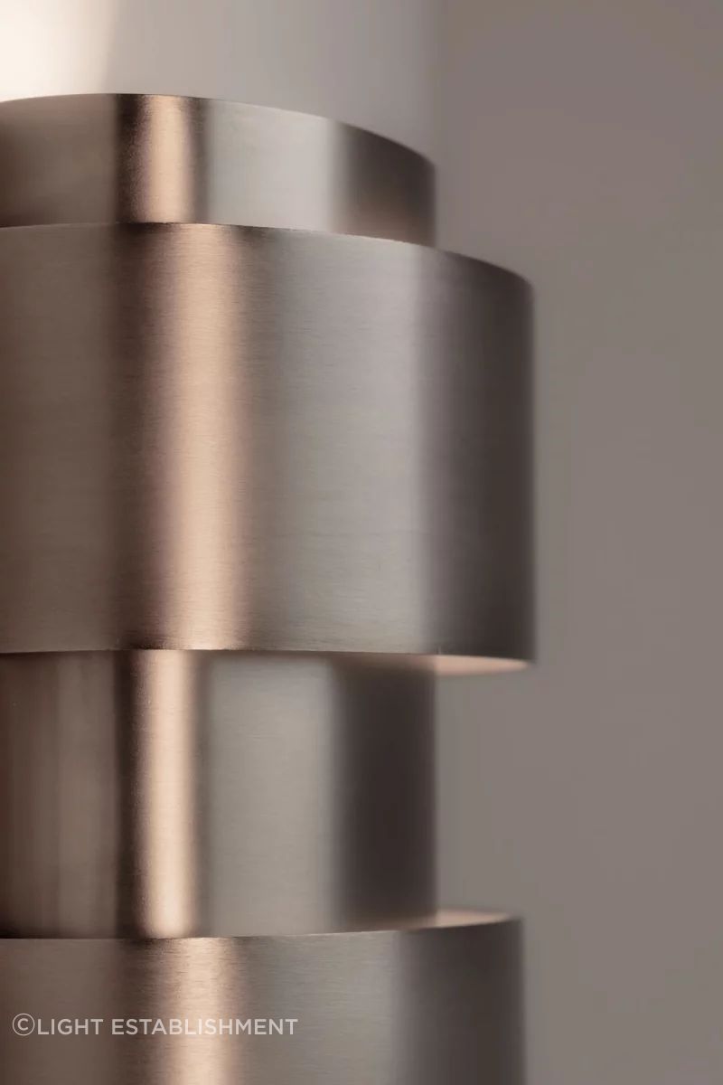 The Band-Oh! design allows for a clever play of light across the surface of the fixture, as well as light directed up and down in a V-shape.