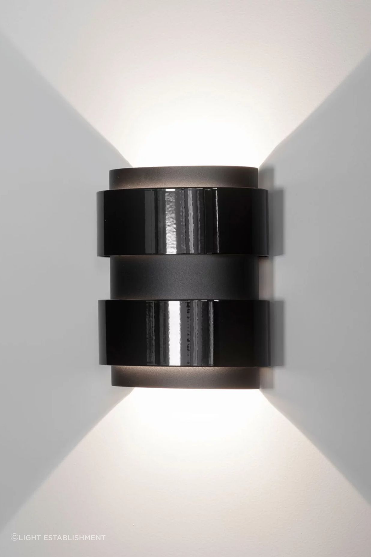 Band-Oh! by Delta Light is double finished in two shades of black, with an inner shell of brushed old bronze.