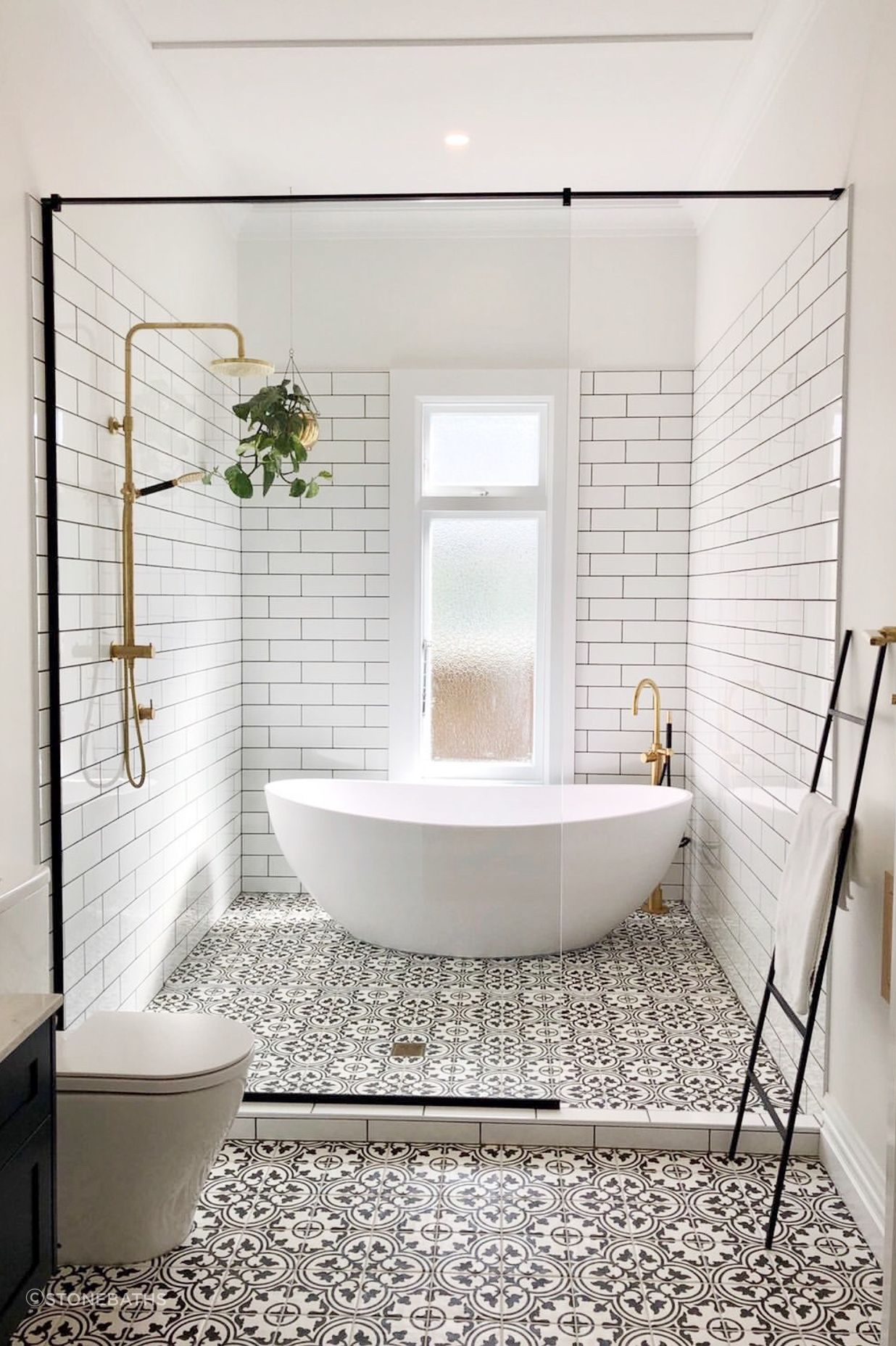 Recline and relax in this Stonebaths high ended freestanding stone bath.