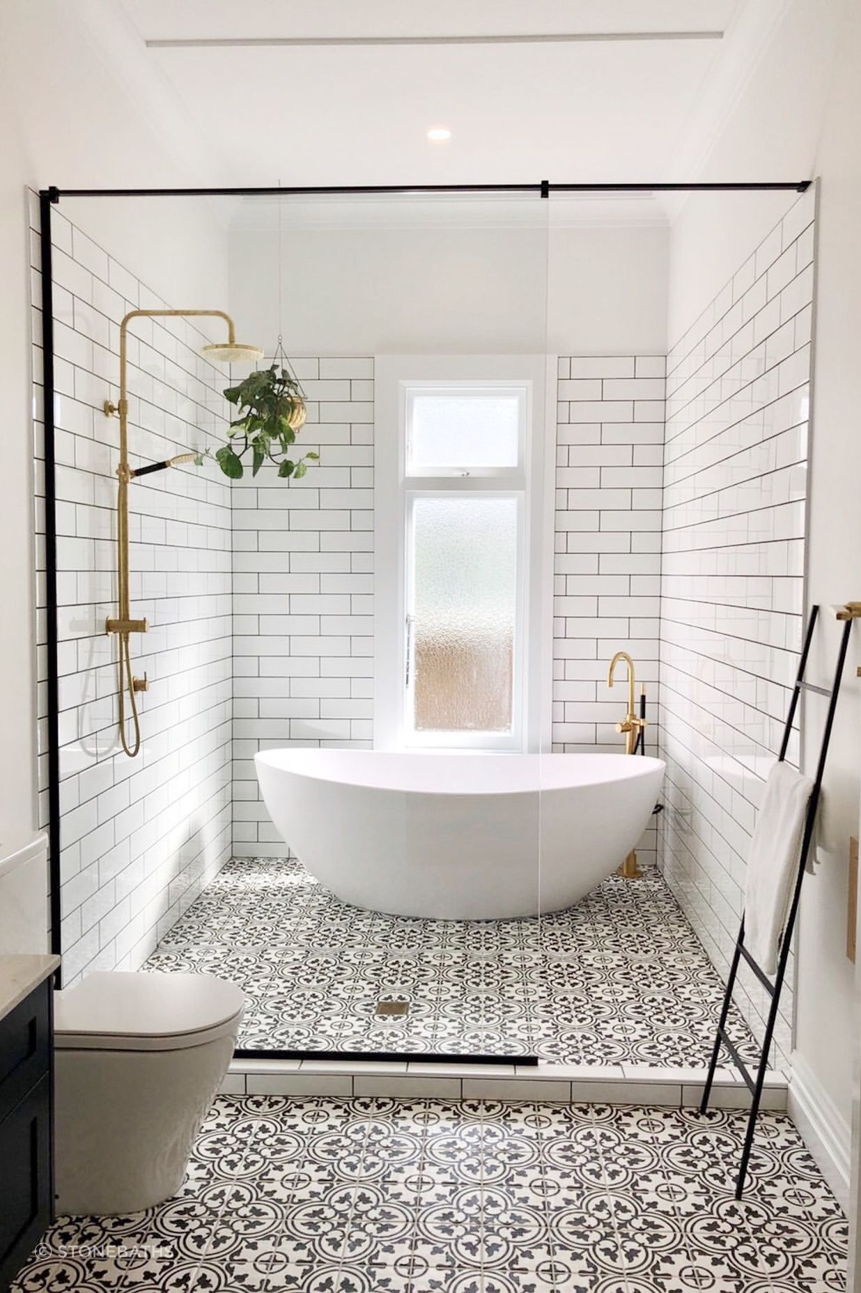 Recline and relax in this Stonebaths high ended freestanding stone bath.