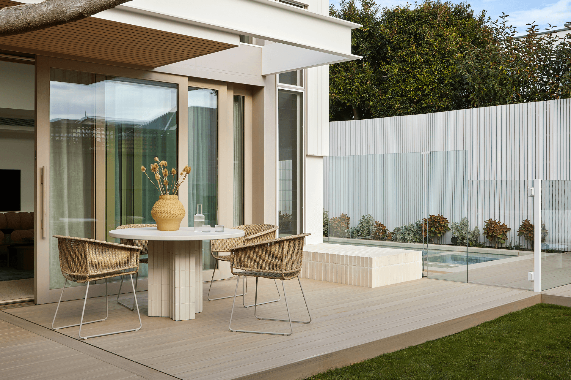 Earthy tones ground the furniture in its natural surroundings, while intricate details draw the eye.