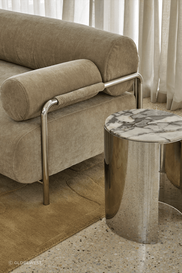 Contrasting materials and rounded forms add visual intrigue from every angle.