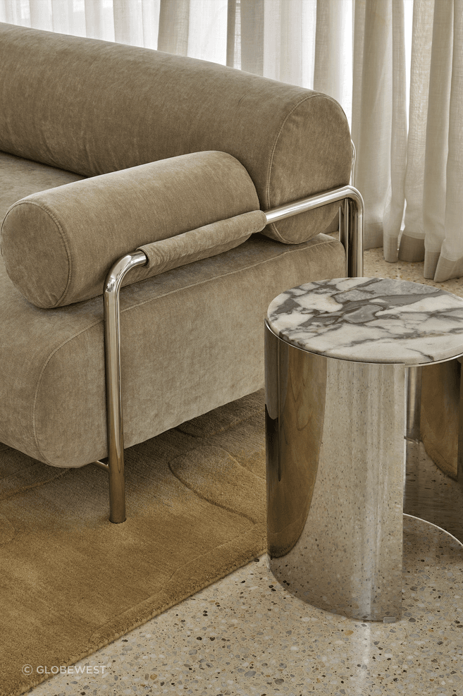 Contrasting materials and rounded forms add visual intrigue from every angle.