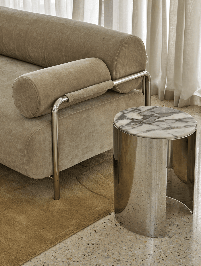 Contrasting materials and rounded forms add visual intrigue from every angle.