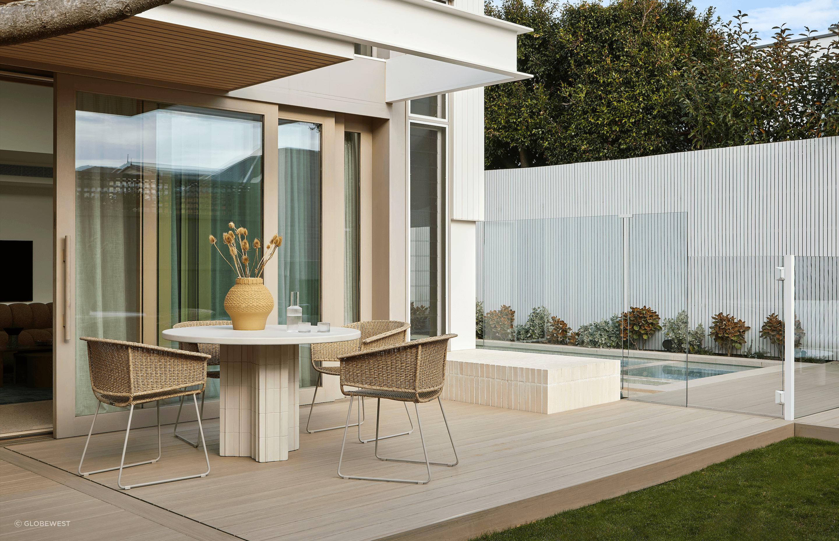Earthy tones ground the furniture in its natural surroundings, while intricate details draw the eye.