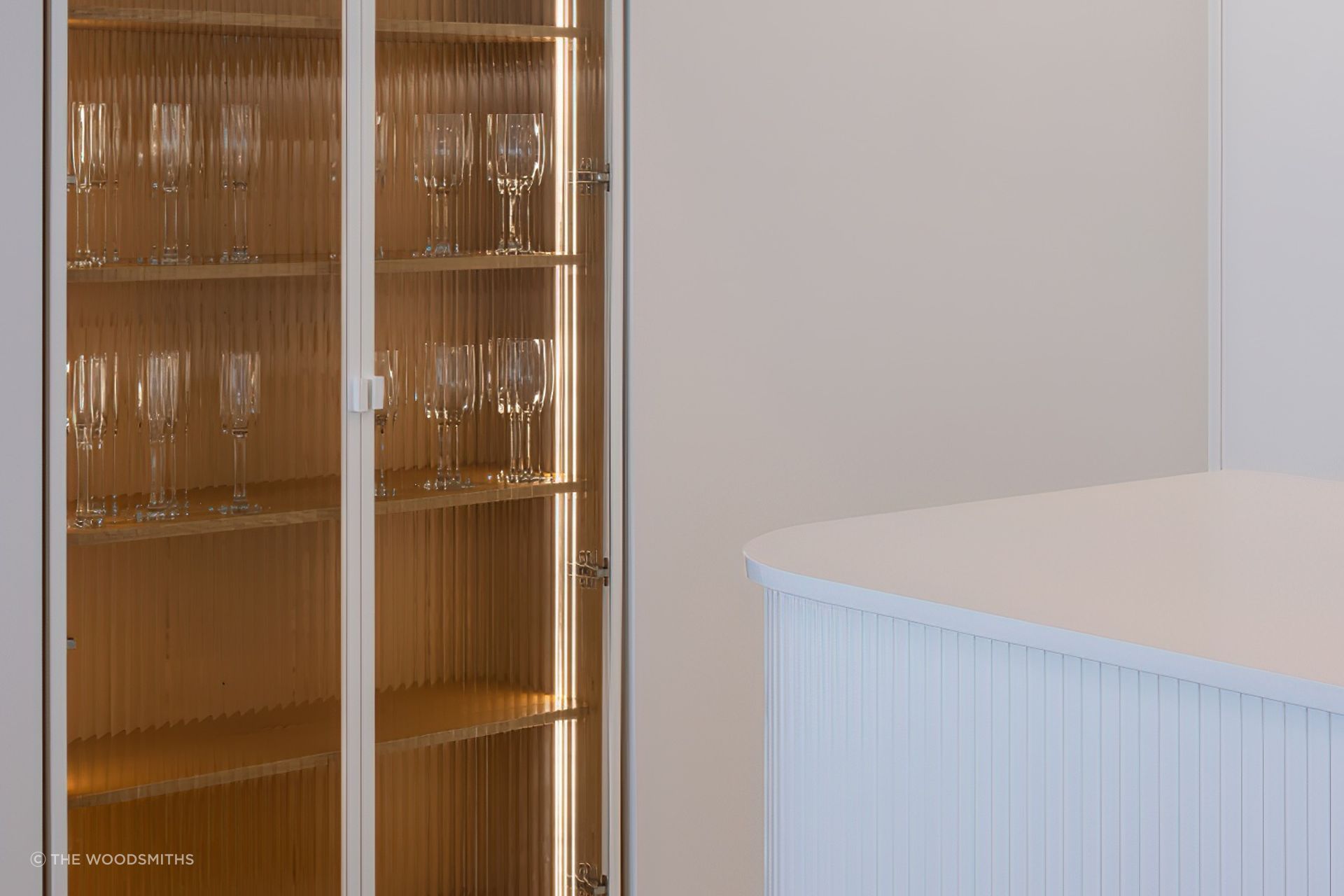 Squareline powder-coated with narrow reeded glass.