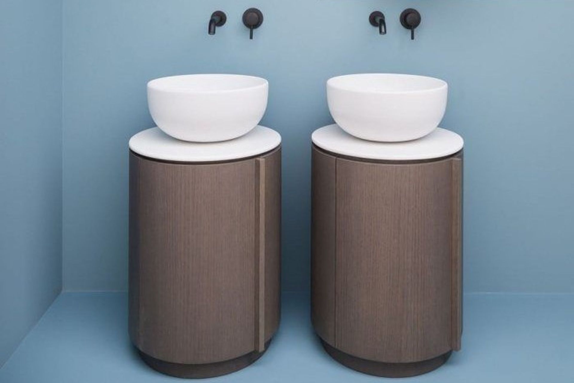 Double vanities are great but two single vanities paired, as seen here with the Arcadia Tiberino by Ceramica Cielo provides an altogether different aesthetic.