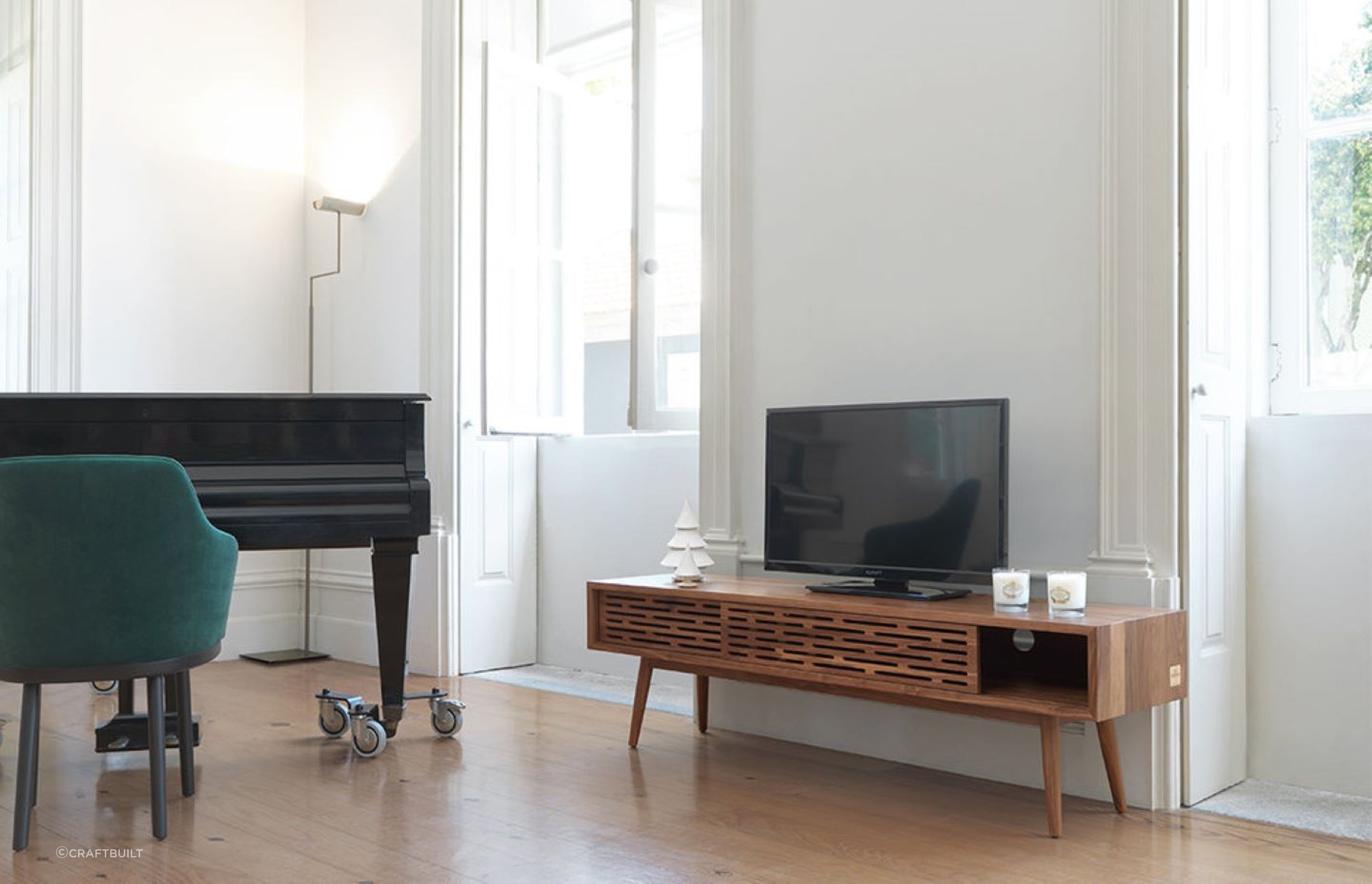 The visually elegant perforated sliding doors of the ALF Italia Novecento TV Cabinet are a great design feature.