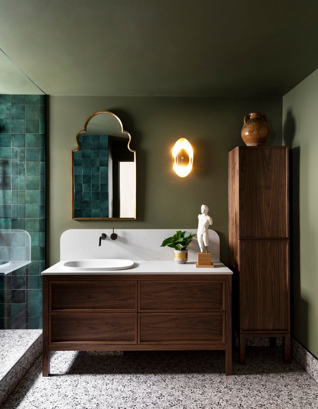 Cabinets with marble countertops look classy in a vintage, or traditional style bathroom.