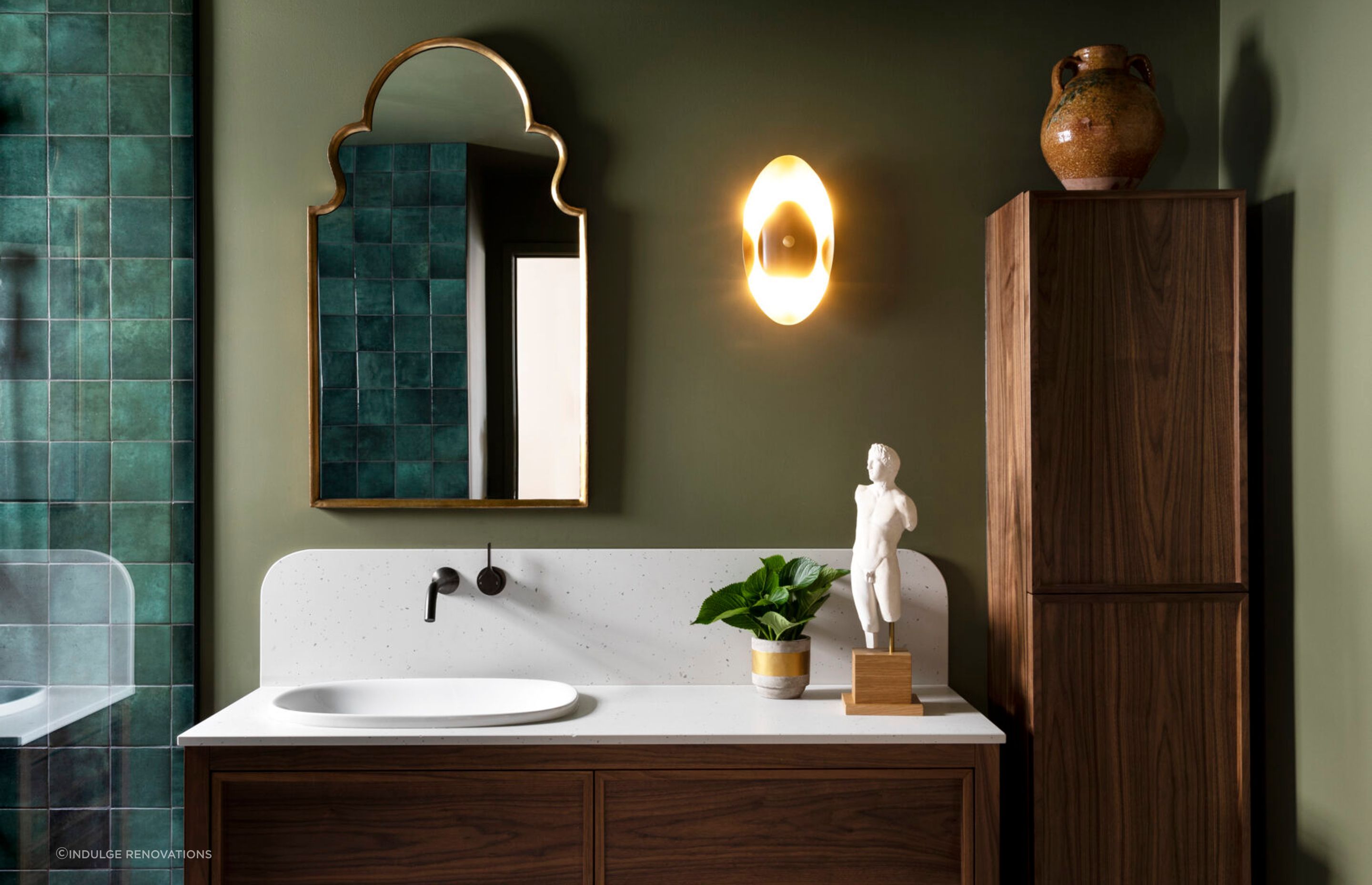 Cabinets with marble countertops look classy in a vintage, or traditional style bathroom.