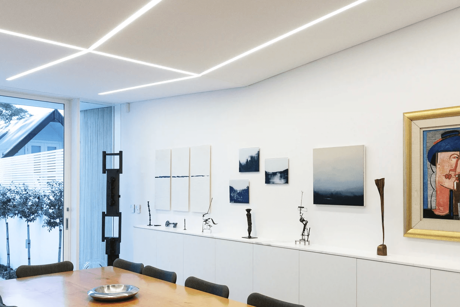 The inverse vaulted ceilings use strip lighting to enhance the angular focal point.