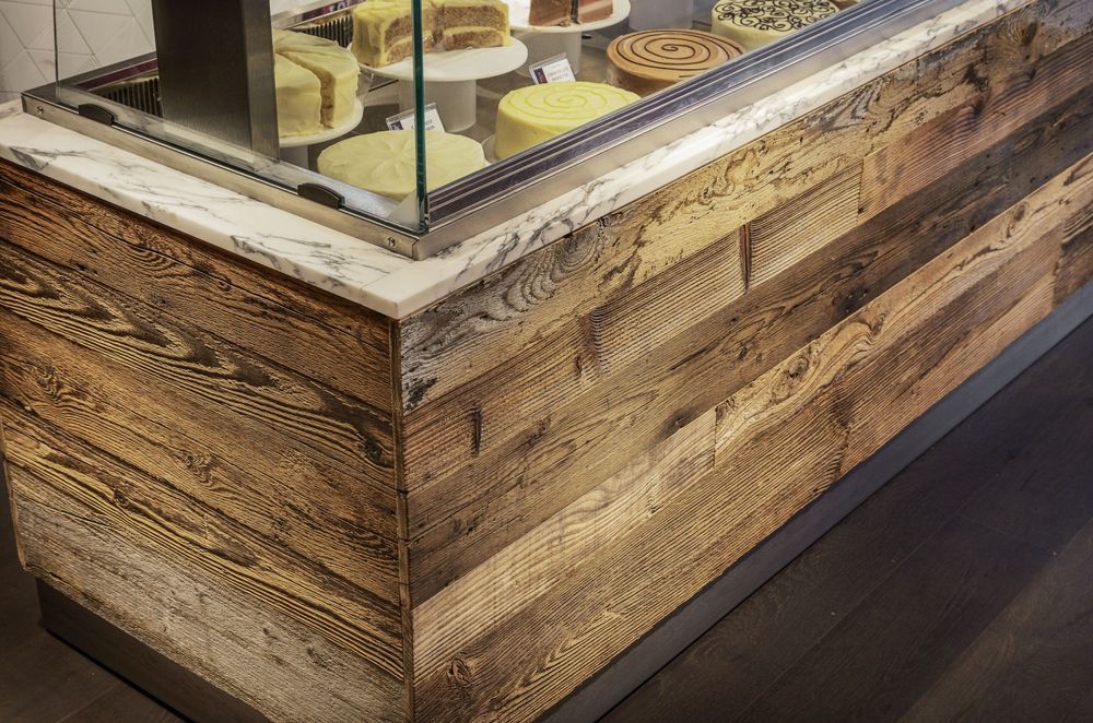 How do you finish corners with decorative wall cladding?