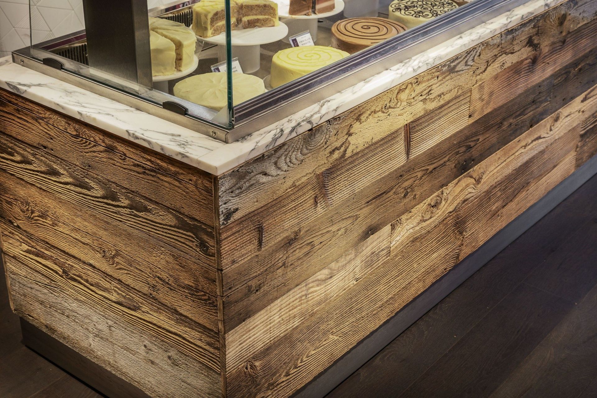 How do you finish corners with decorative wall cladding?