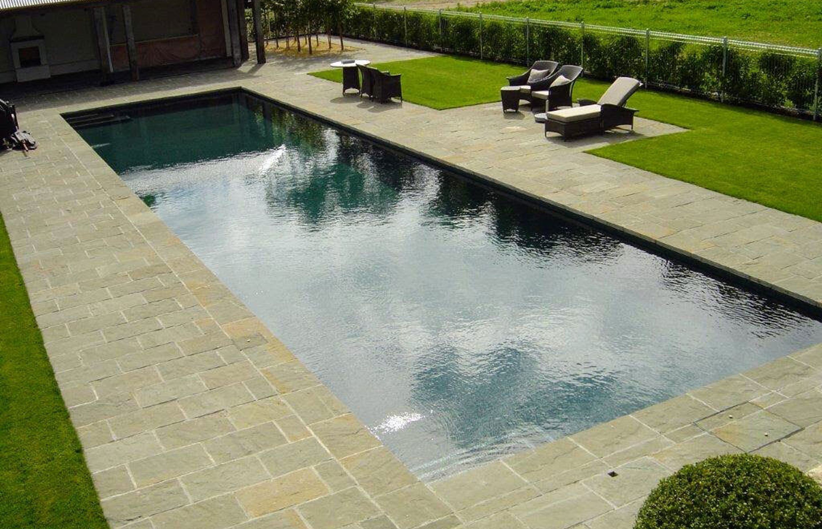 Create impact around your pool—and a naturally non-slip surface—by utilising Paradise Quarry paving stones as pool coping and surrounds.