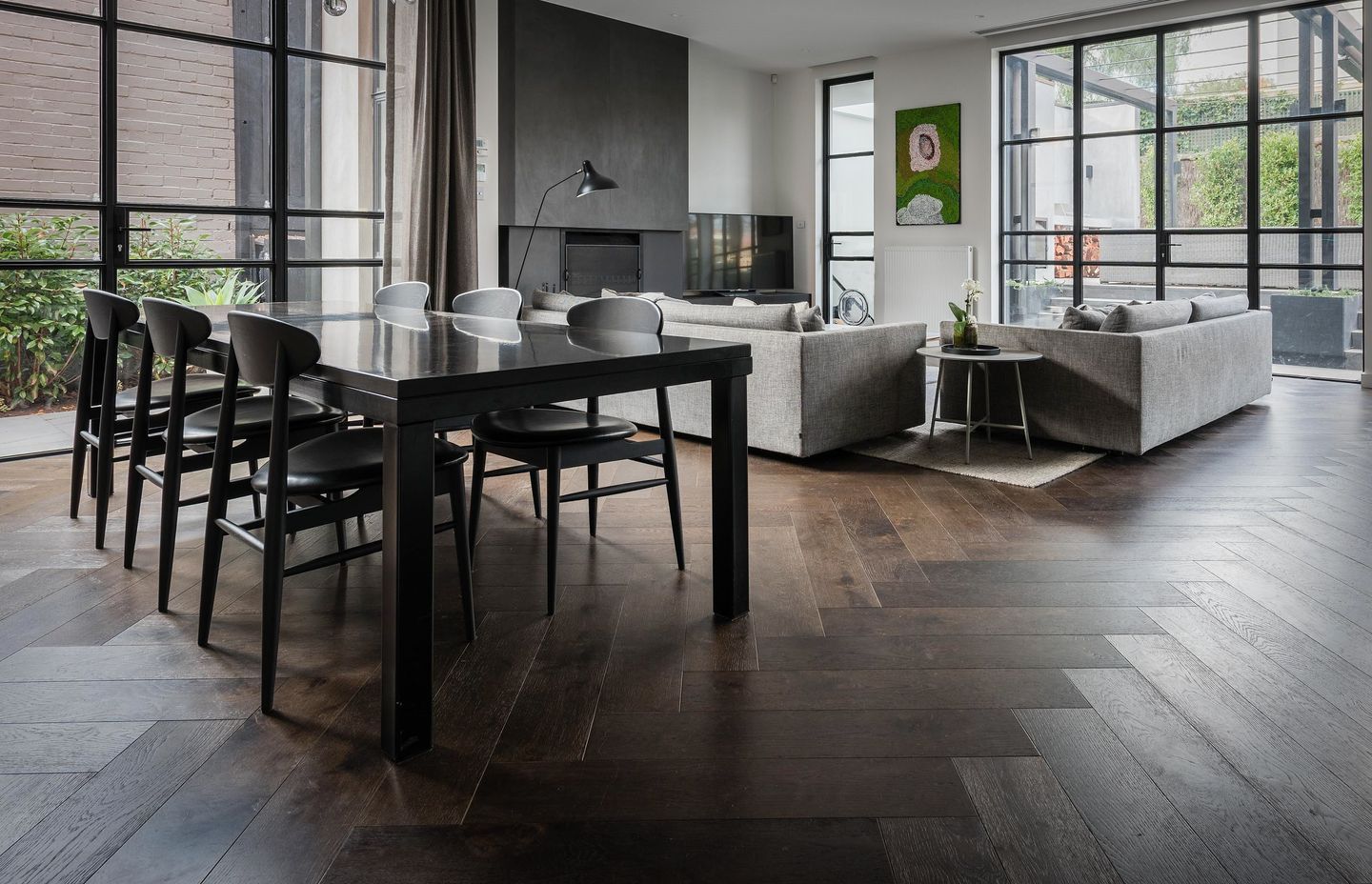 Arranged in one of the earliest decorative flooring patterns—herringbone—this contemporary floor proves that centuries-old design is as relevant today for creating a sophisticated interior scheme.