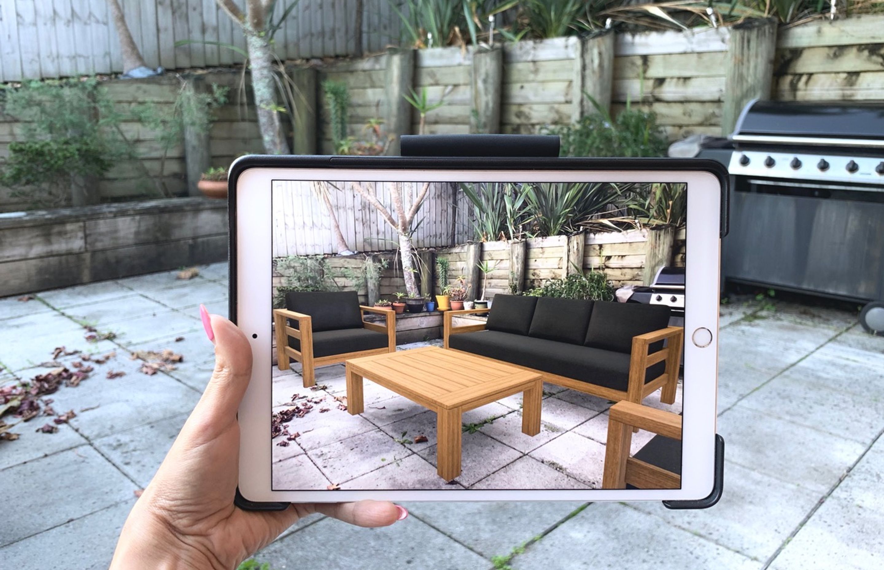 Once selected, the chosen outdoor setting downloads to the user's tablet or smartphone and can be positioned in the virtual site exactly how it would be set up to use.  Users can even walk around the setting to view it from multiple angles.