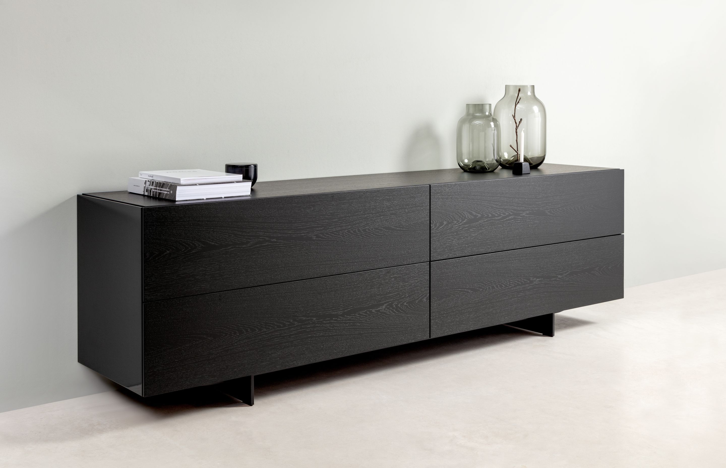 The Rolf Benz Stretto cabinet system brings order to every living space and comprises fully customisable lowboys, sideboards, highboys, a media console, a bedside table, wardrobes and open elements.