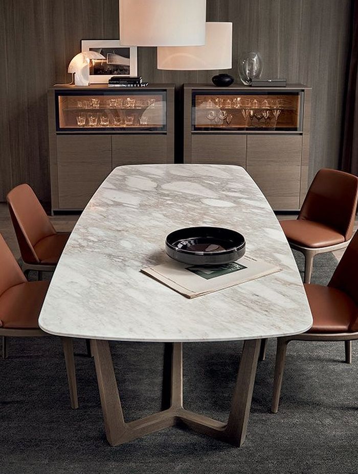 The exquisite Concorde Table with marble tabletop from Poliform