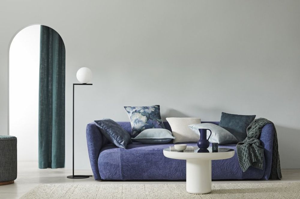Modern sofa and cushion styling at the Weave Home