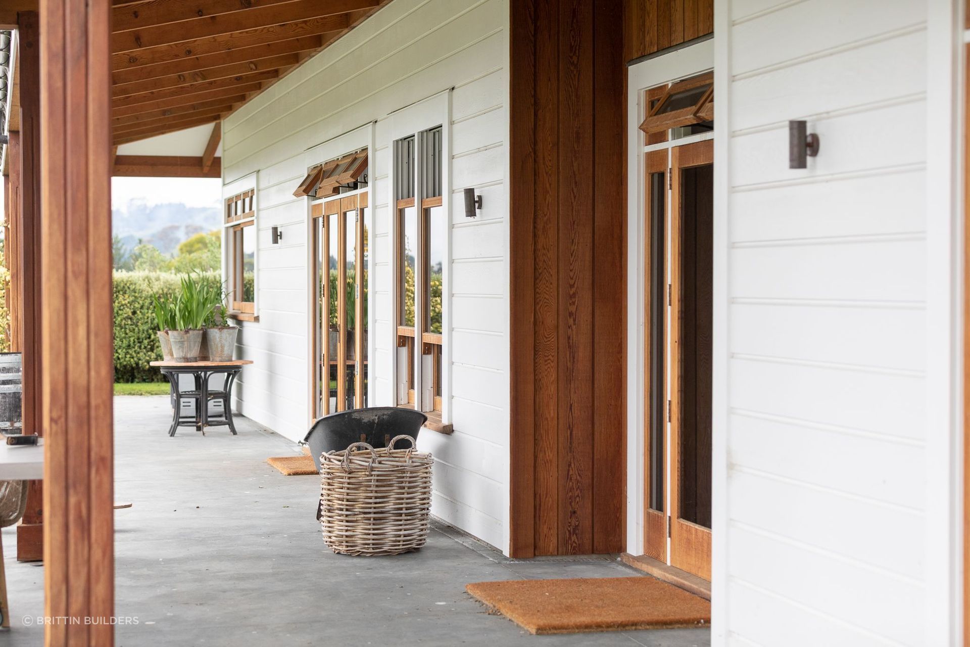 Gorgeous French doors and sash windows are featured in this stunning build.