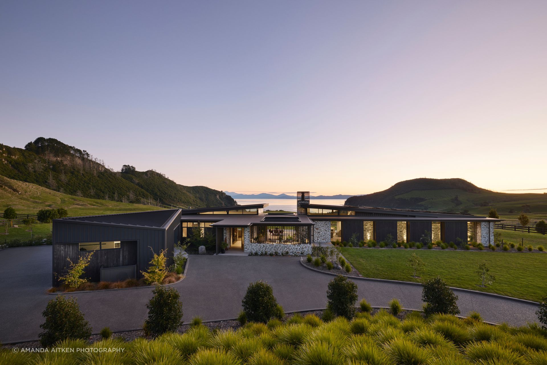 Turner Road Architecture reinterprets the timeless materials of traditional lakeside vernacular at Kaiapo Bay Lake House.