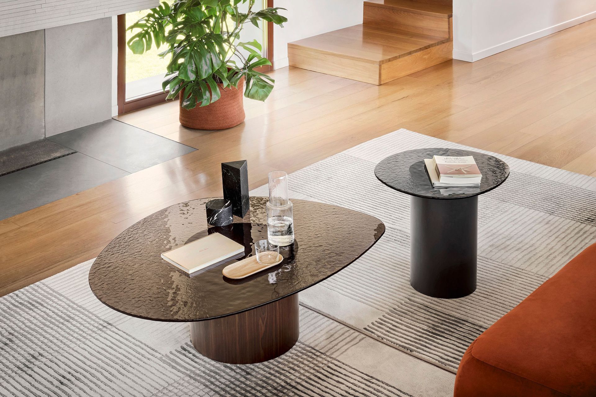 This textured glass tabletop brings this coffee table a unique look and texture.