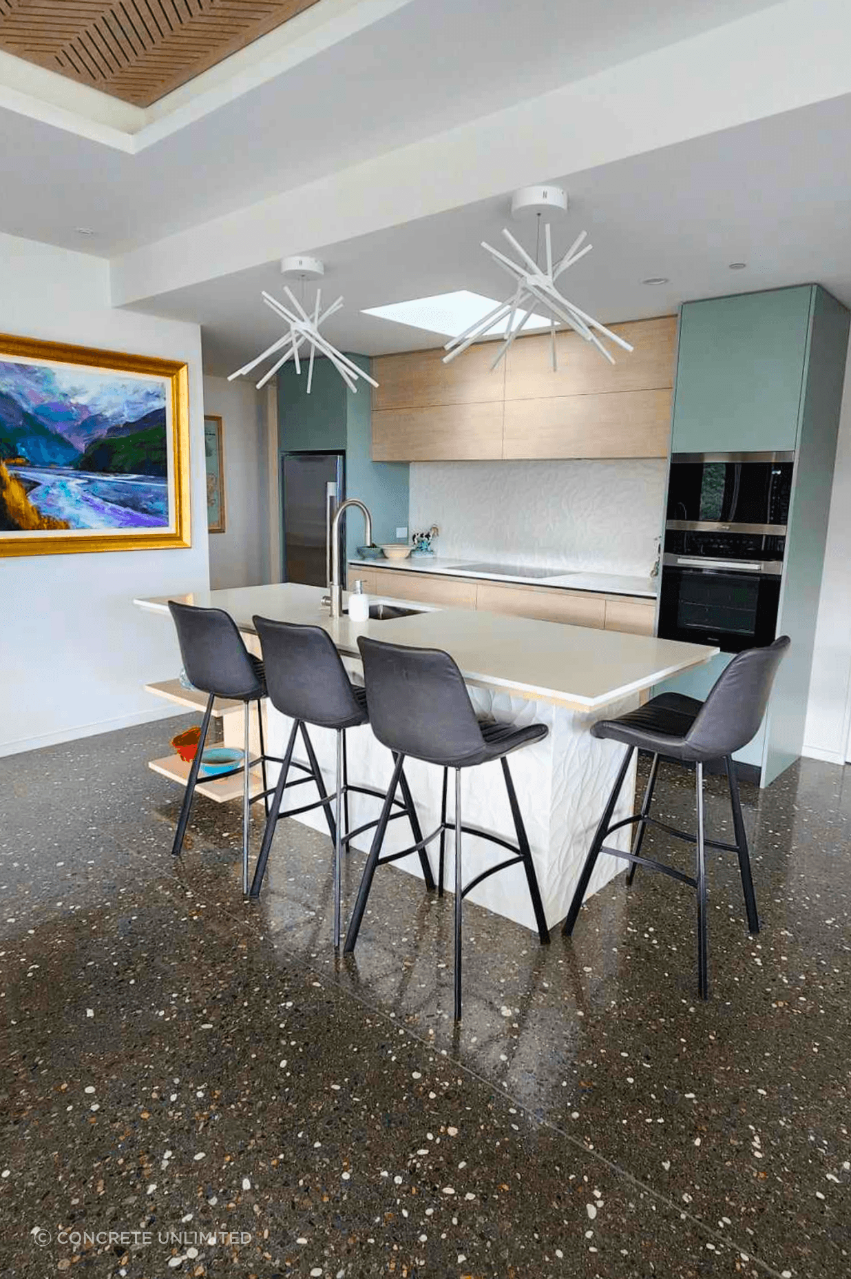 Polished concrete floors are a great way to bring a unique blend of style and functionality to the interior of your home, as featured in the Skylark Rise project