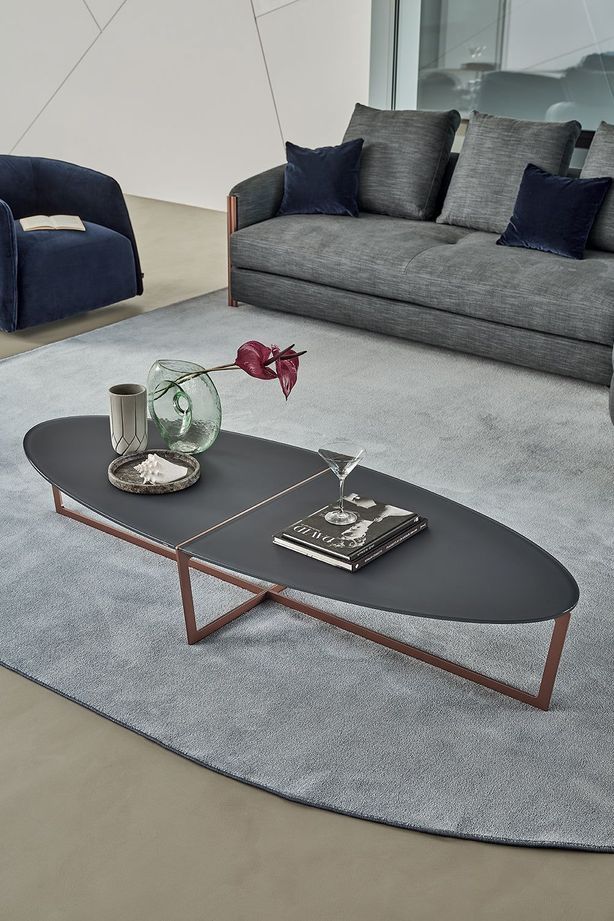 Oval coffee tables can give you more flexibility when designing a living space, compared to other coffee tables.
