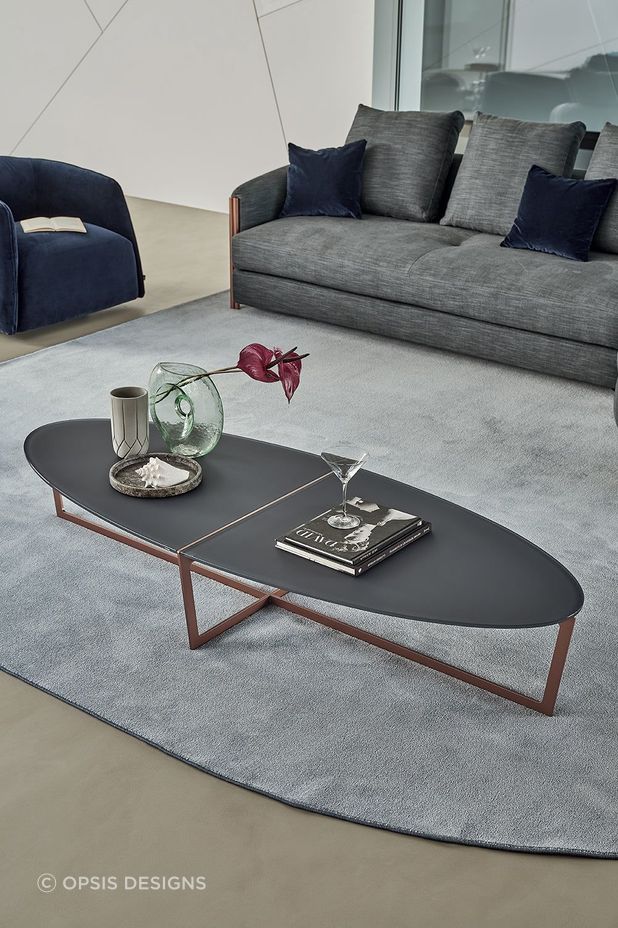 Oval coffee tables can give you more flexibility when designing a living space, compared to other coffee tables.