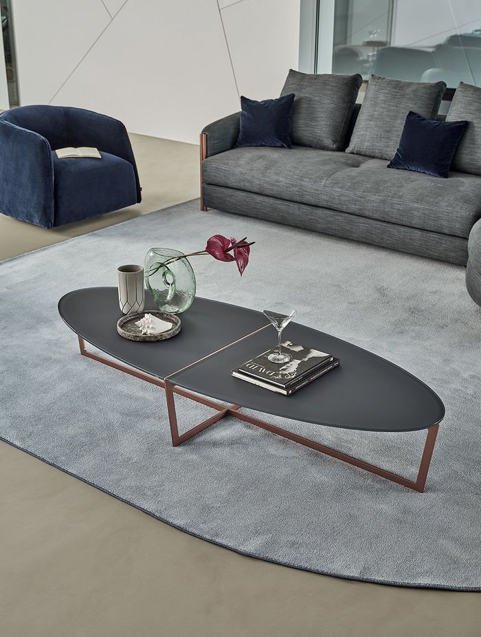 Oval coffee tables can give you more flexibility when designing a living space, compared to other coffee tables.