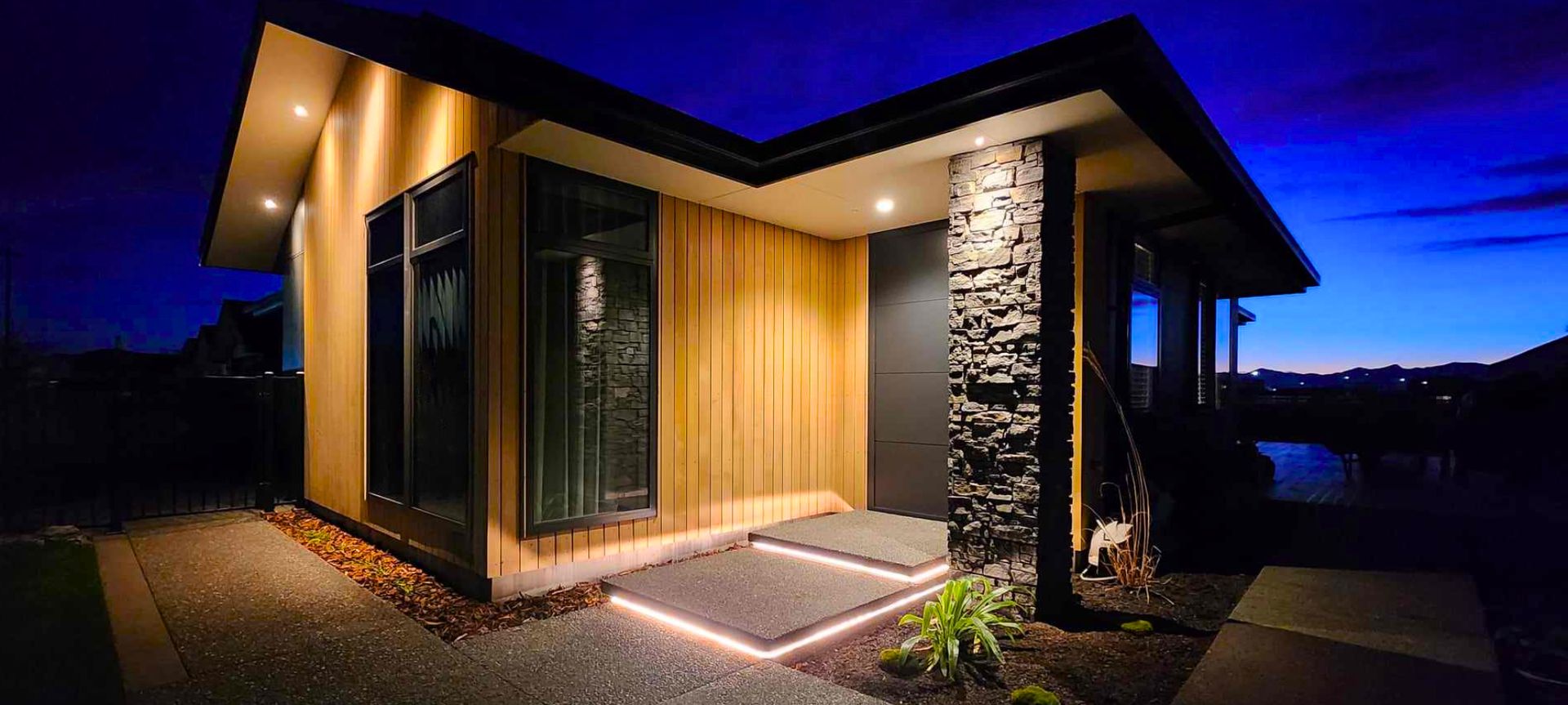 Innovative LED-lit steps for this home's entryway as seen in Concrete Unlimited's Hanworth Road Project
