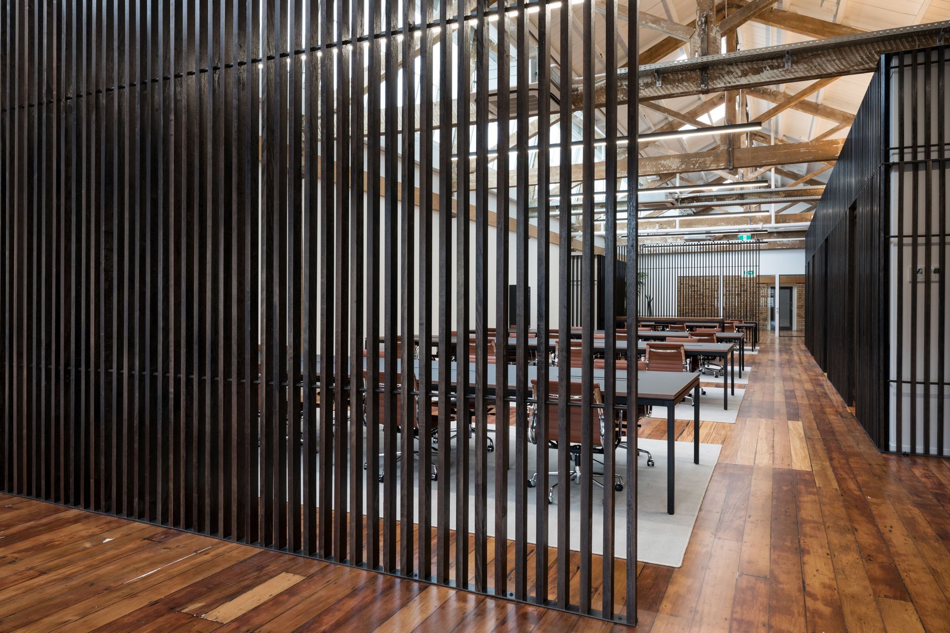 Akwa hardwood battens coated in a ‘Smoke Brown’ Woca Diamond Oil were used for the Textile Lofts office space, but different hardwoods and finishes can be used to achieve different aesthetics.