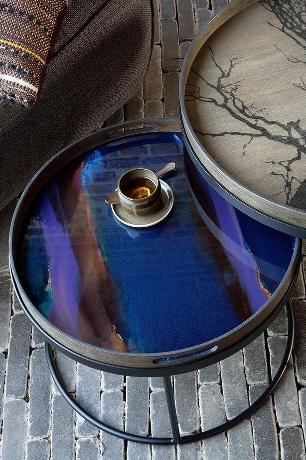 The raised edges on tray coffee tables help ensure items and valuables stay in place.
