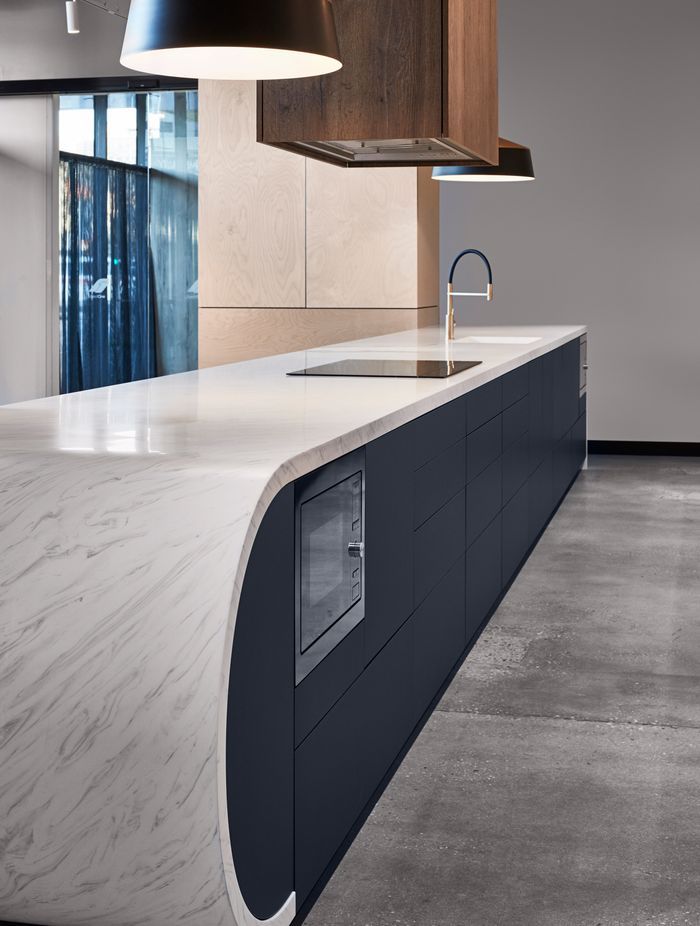 Premium acrylic benchtops, like the Meganite from ForestOne, can be moulded into unique shapes.