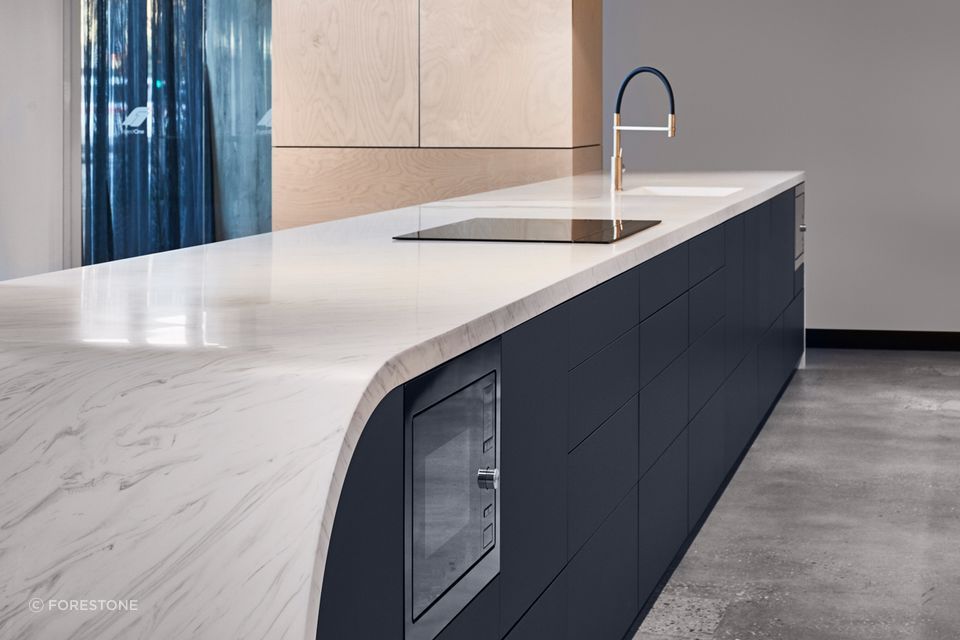 Premium acrylic benchtops, like the Meganite from ForestOne, can be moulded into unique shapes.