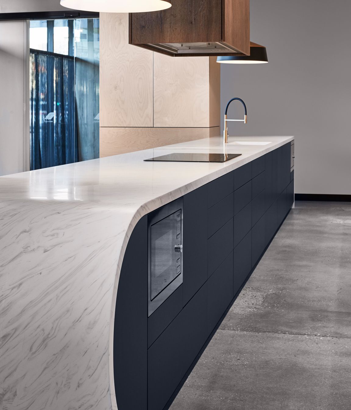 Premium acrylic benchtops, like the Meganite from ForestOne, can be moulded into unique shapes.