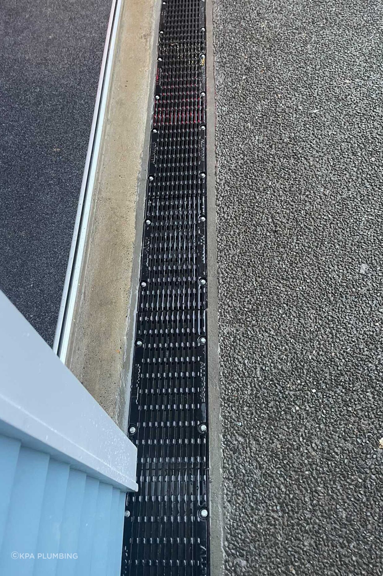 Channel drains are a common solution for existing homes.
