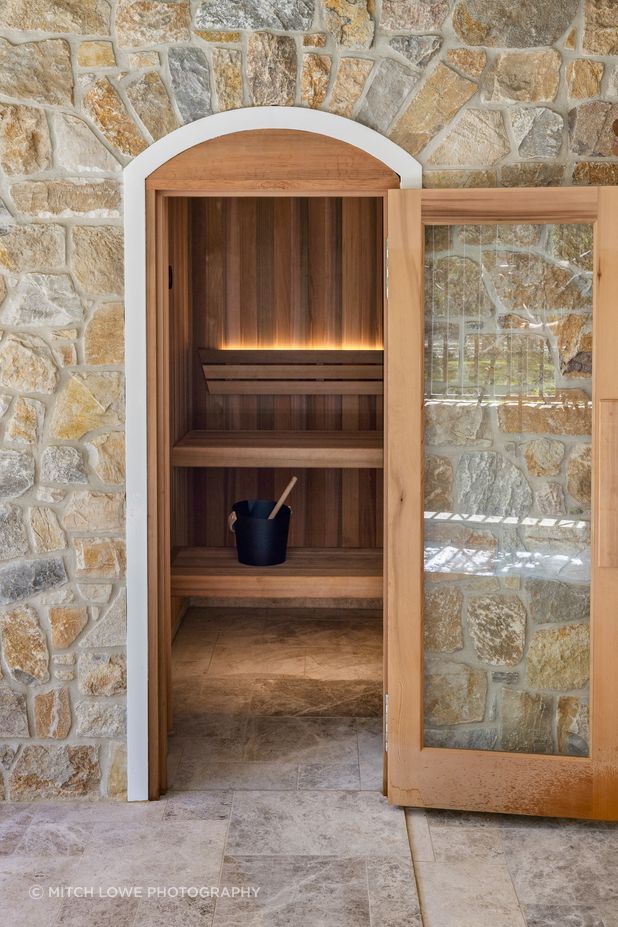 On both floors and walls, natural stone can add character, texture and depth to a space.