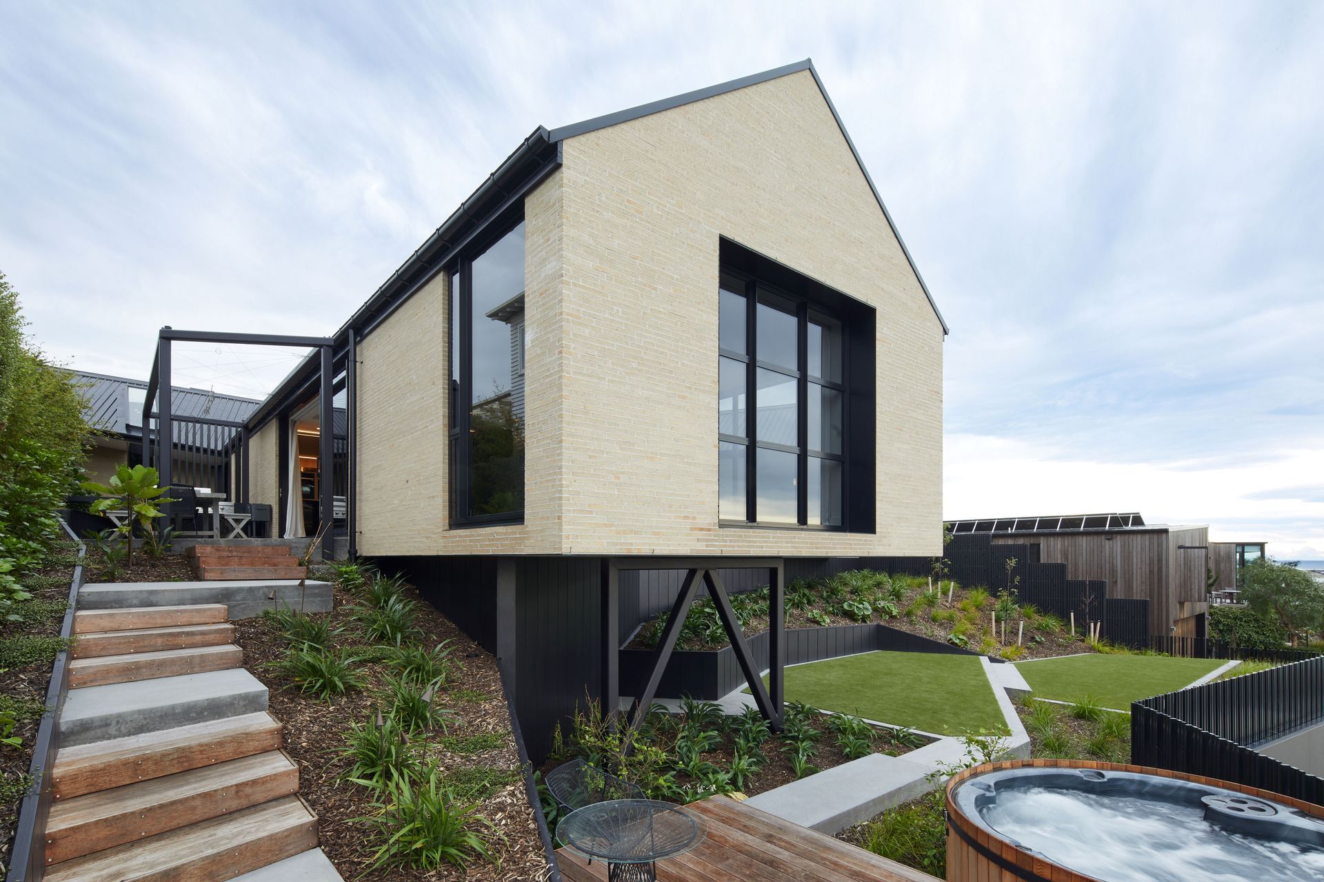The exquisite, cantilevered design of this contemporary home constructed by DJ Hewitt Builders, shows how attention to detail can result in timeless architecture.
