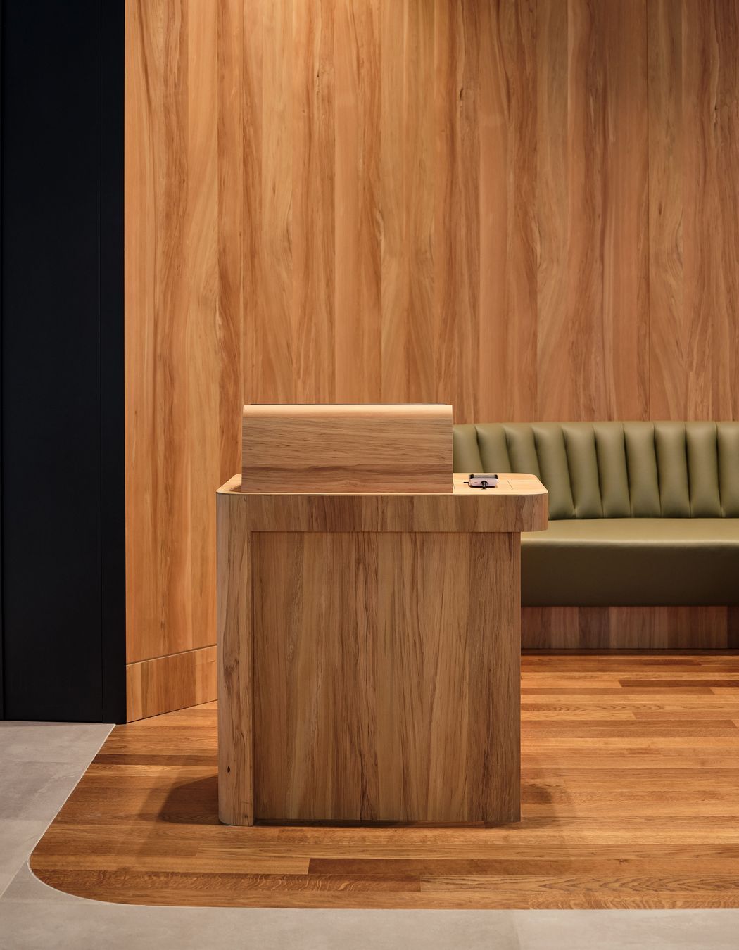 Clear wayfinding is important; visitors should easily understand where to go. This beautifully crafted Maitre'D stand is a great example of pairing logical wayfinding with highly-crafted design.