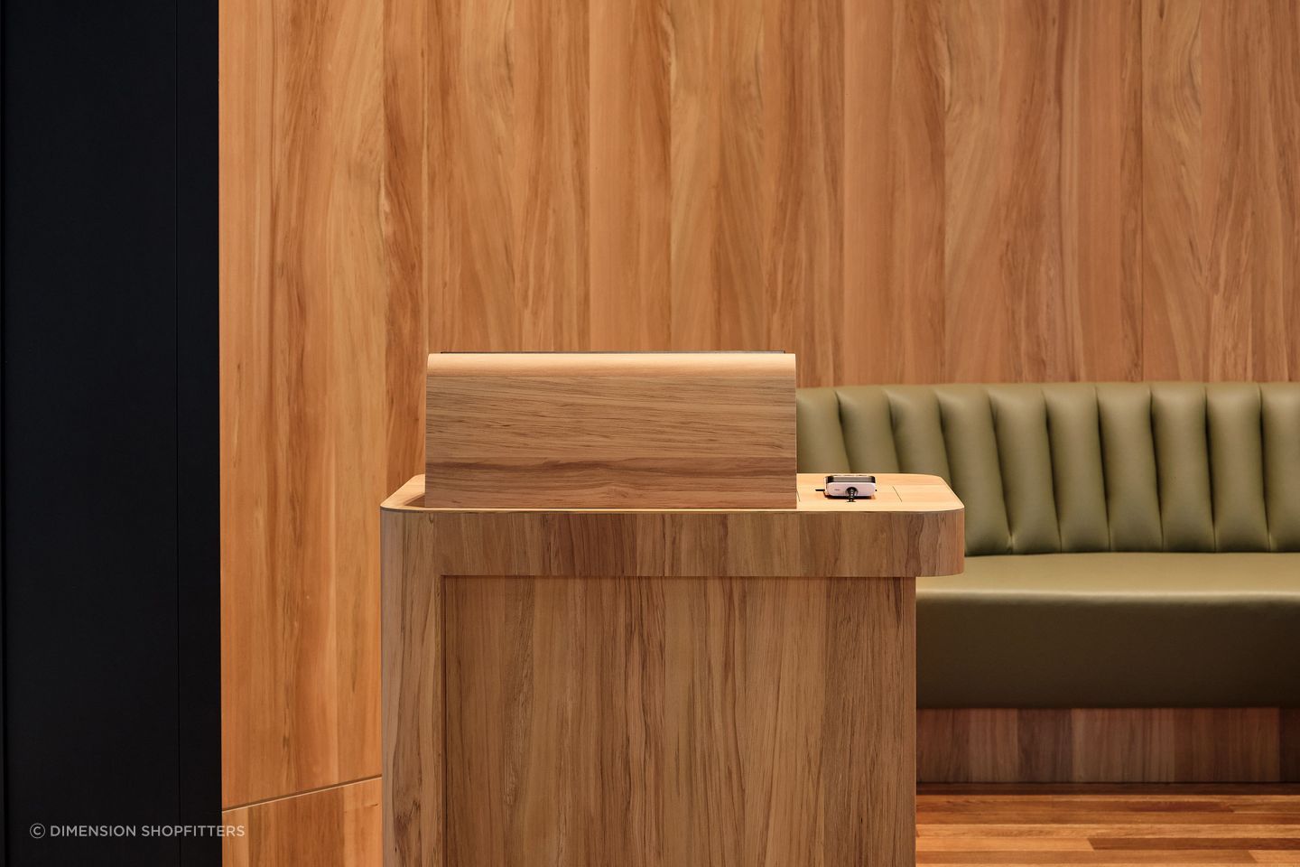Clear wayfinding is important; visitors should easily understand where to go. This beautifully crafted Maitre'D stand is a great example of pairing logical wayfinding with highly-crafted design.