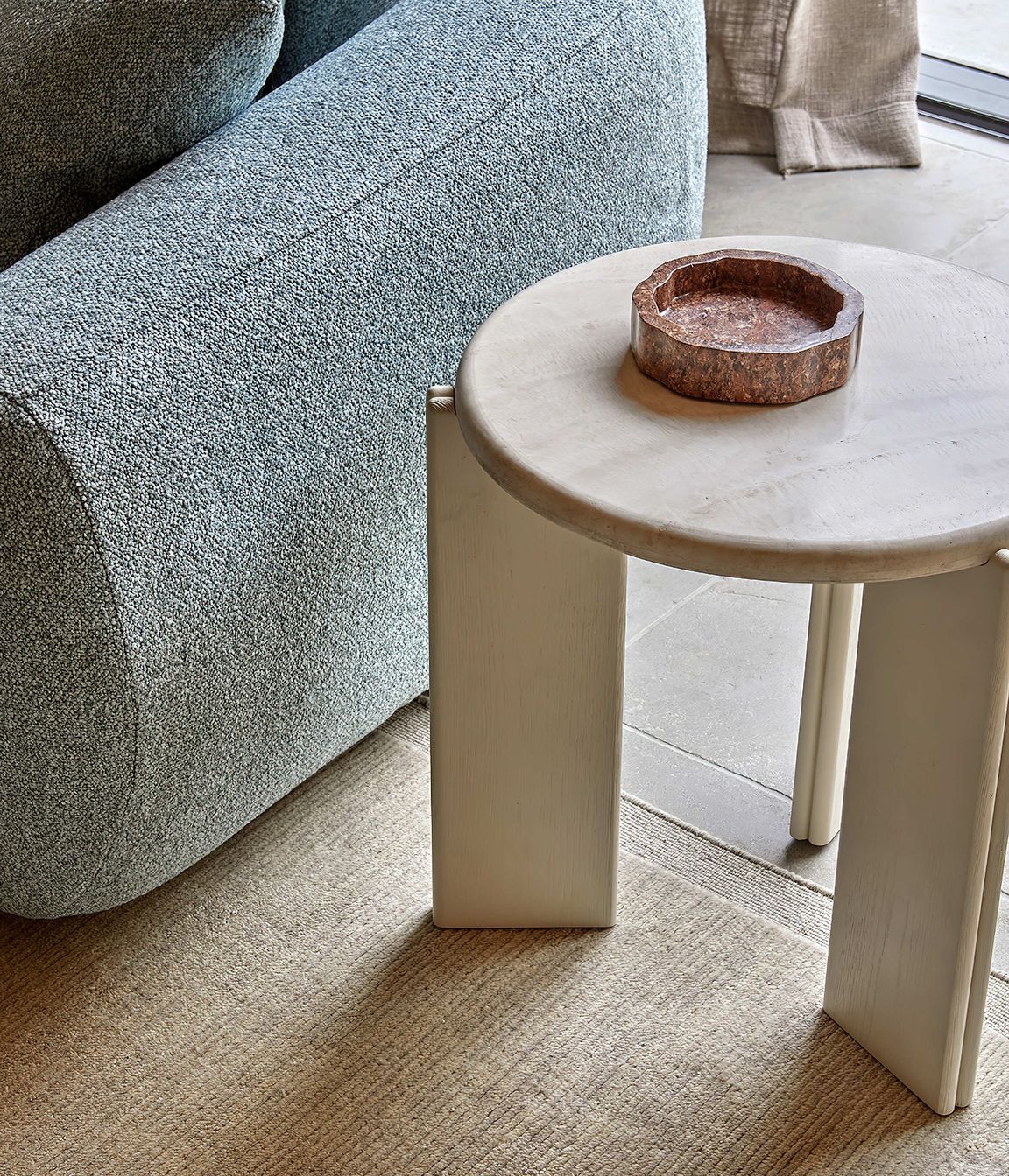 Pictured here: Ray Marble Side Table, Felix Loop 3 Seater Sofa, Rufus Ares Bowl, Bower Frame Rug (Cloud)