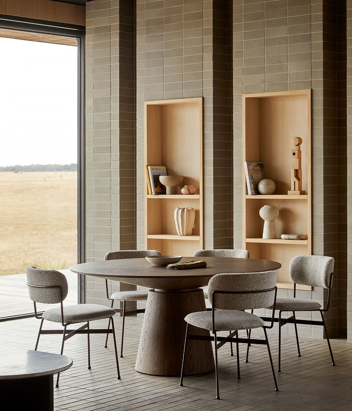 Pictured: Classique Round Dining Tables, Piccolo Dining Chair, Hanson Eden Set of 3 Bowls, Talua Goblet Bowl, Orb Set of 3 Sculptures, Coral Vessel & Spire Vessels, Boden Stripe Bud Vase, Theron Geo Sculpture, Rufus Indra Pill Shallow Bowl
