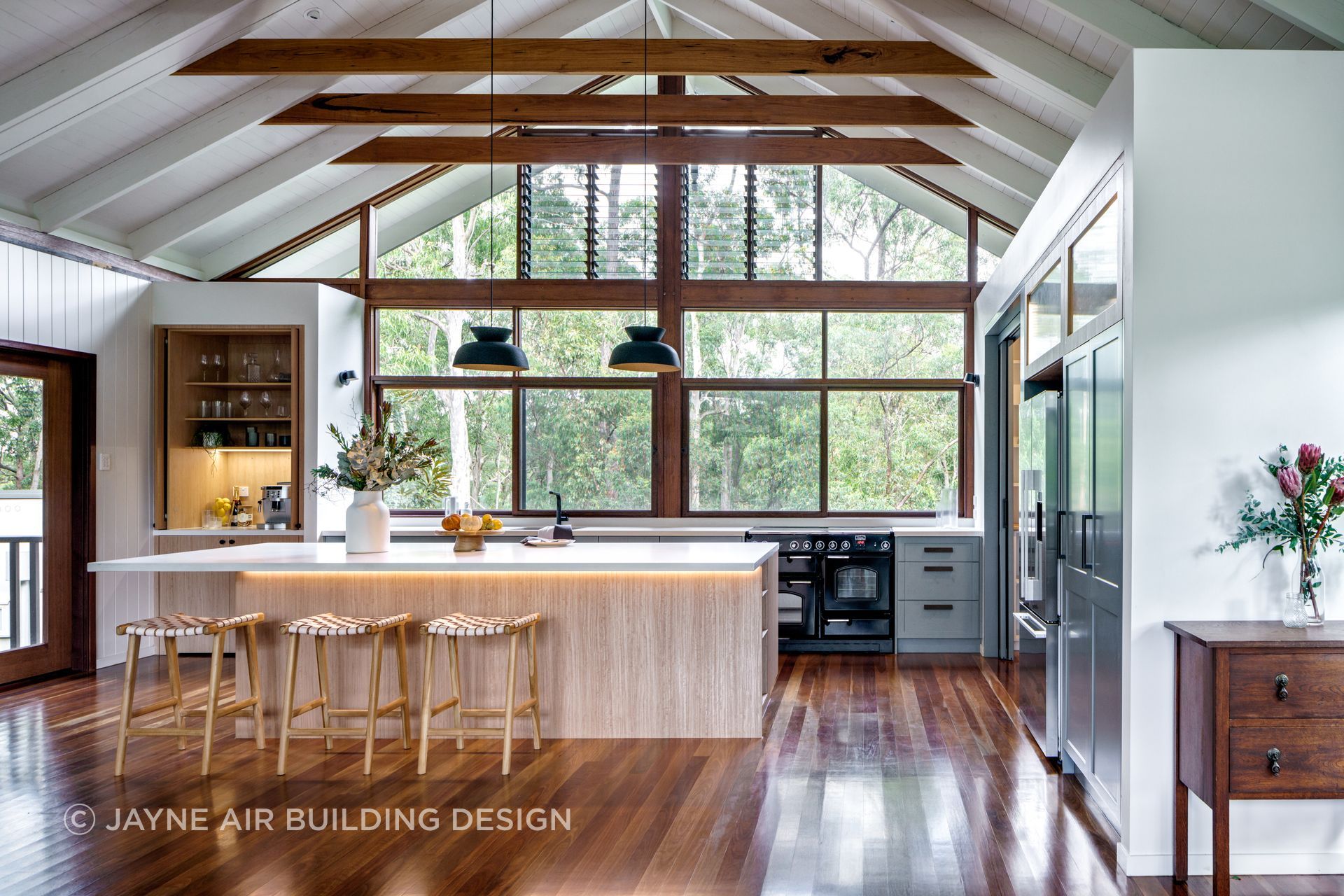 A stunning showcase of contemporary elegance, the modern Warner kitchen designed by Jayne Air Building Design perfectly blends style and functionality