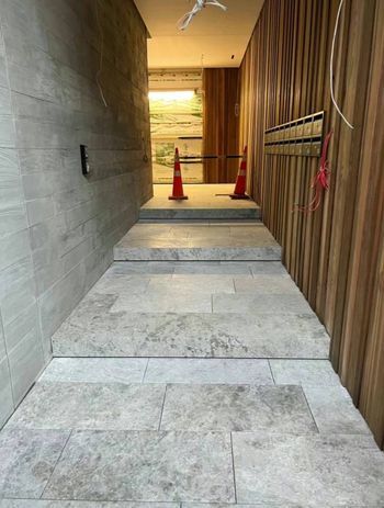 Here, Casa Ecco demonstrates expertise in tiling steps seamlessly.