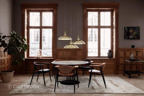 Rugs are often placed underneath a dining table for decorative purposes and to protect flooring.