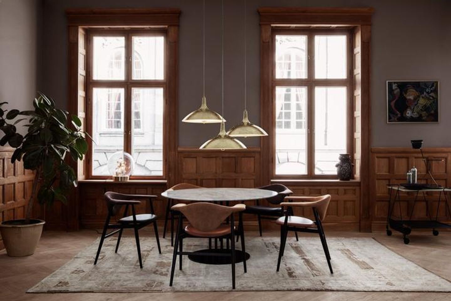 Rugs are often placed underneath a dining table for decorative purposes and to protect flooring.