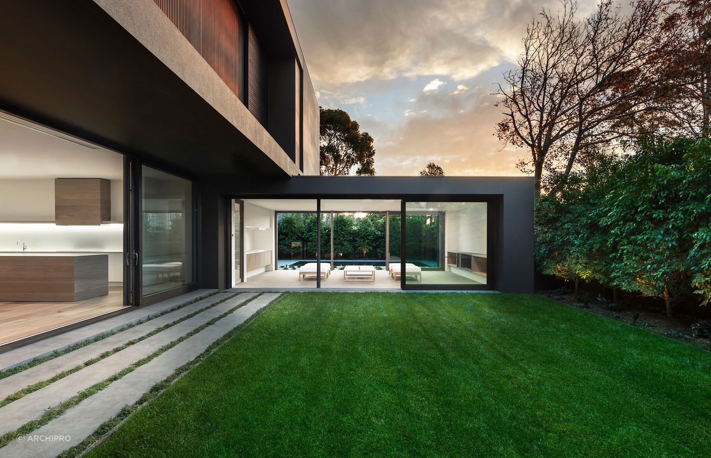 At Bay St, a restrained material palette and carefully controlled openings transform an exposed site into a calm, north-facing refuge. | Photo Credit: John Wheatley