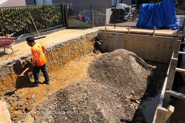 The existing pool liner &amp; walls were removed. The pool was boxed &amp; formed and some hand digging required to create the new modern rectangular shape that was desired.