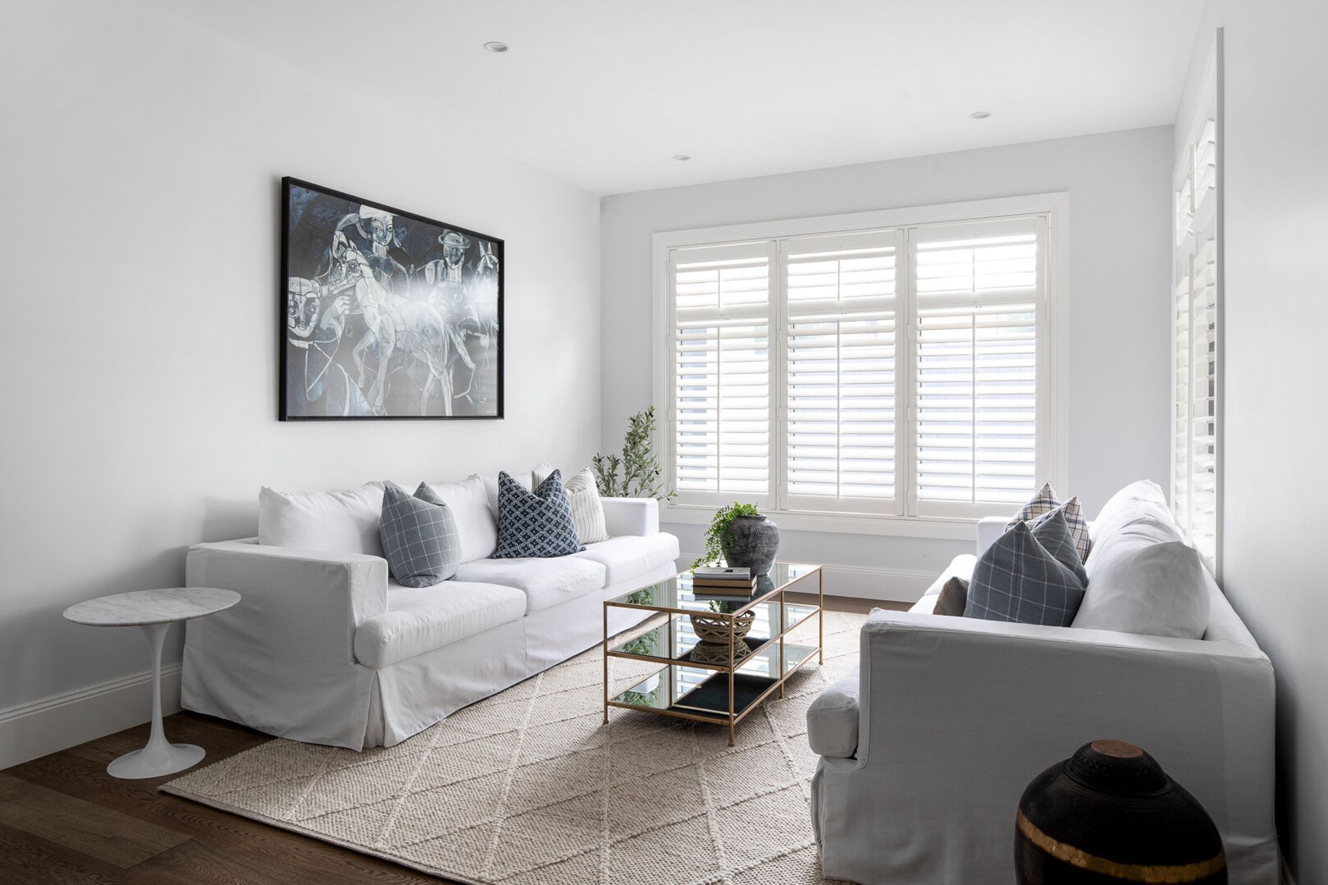 A neutral colour palette is the foundation of this living room. Project: Hamptons House by Vasi. Photography: Dylan James.